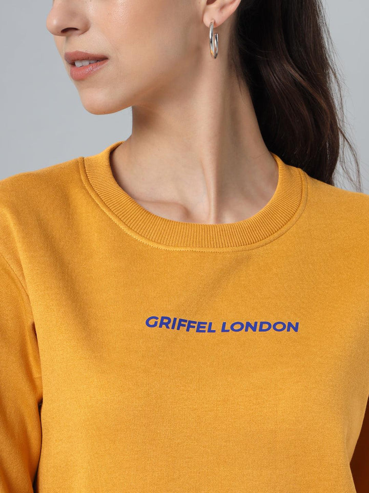 Griffel Women’s Printed Round Neck Mustard Cotton Fleece Full Sleeve Sweatshirt - griffel